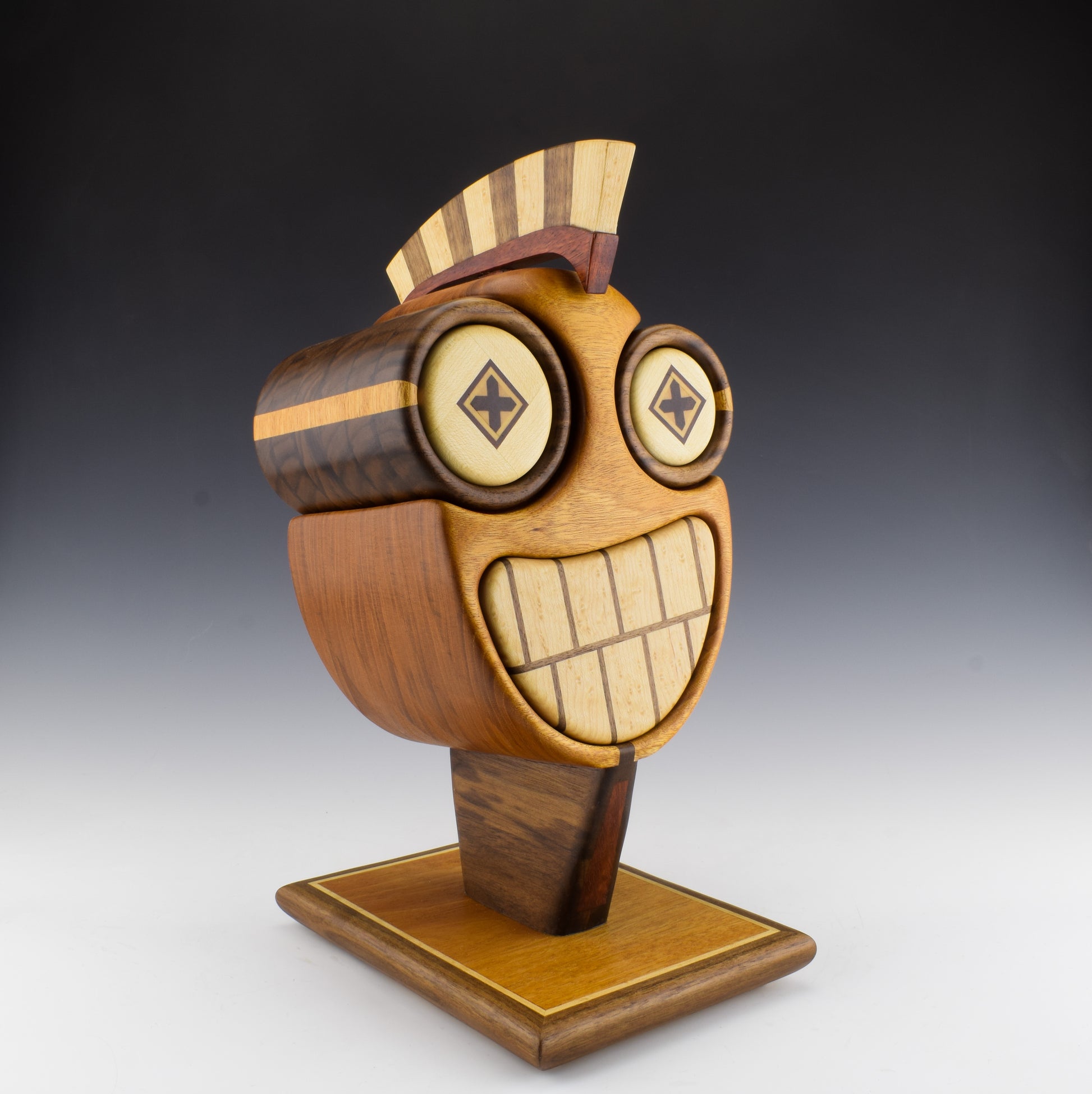 Arguably the most beautiful bandsaw box I ever made. I call it Alexios and it's made of mahogany, walnut, maple and bloodwood. Designed and Handcrafted in Canada by Simon Roy