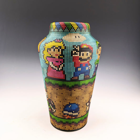 Nintendo characters posing on a pixel art vase made of maple. Features a hidden compartment. Handcrafted in Canada by roysbox