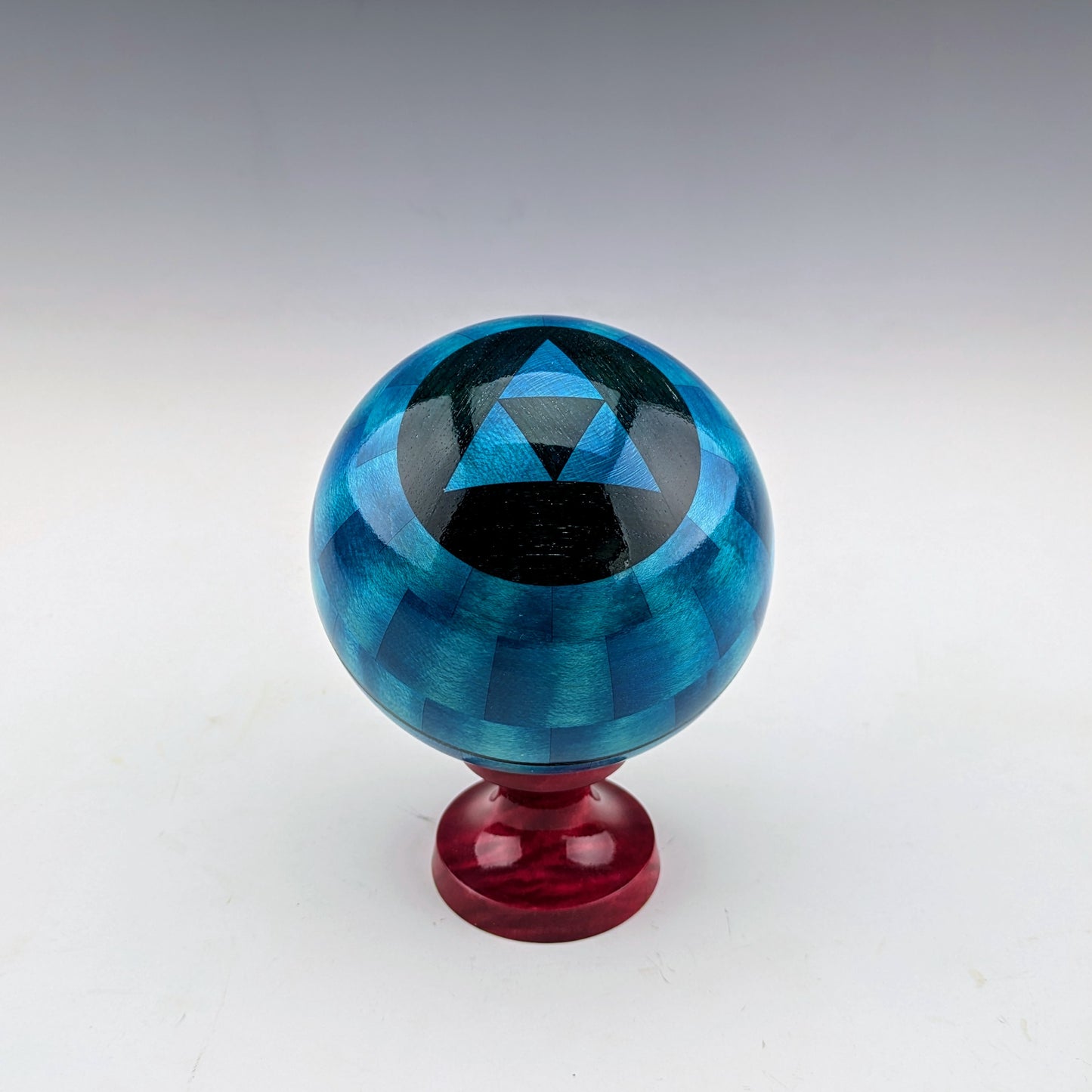 Blue Ball Box on a red pedestal. Maple and walnut. Made in Canada by roysbox