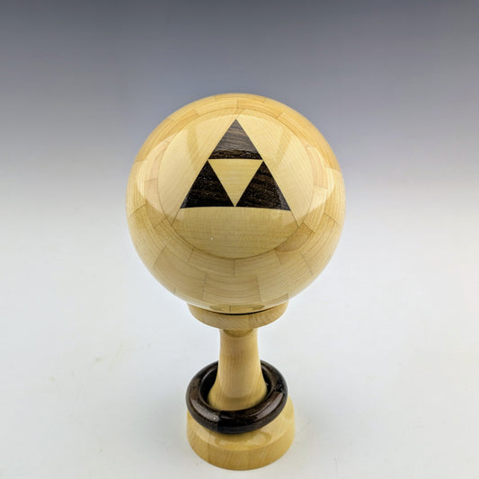 Maple threaded sphere box with a walnut captive ring. Handcrafted in Canada by roysbox