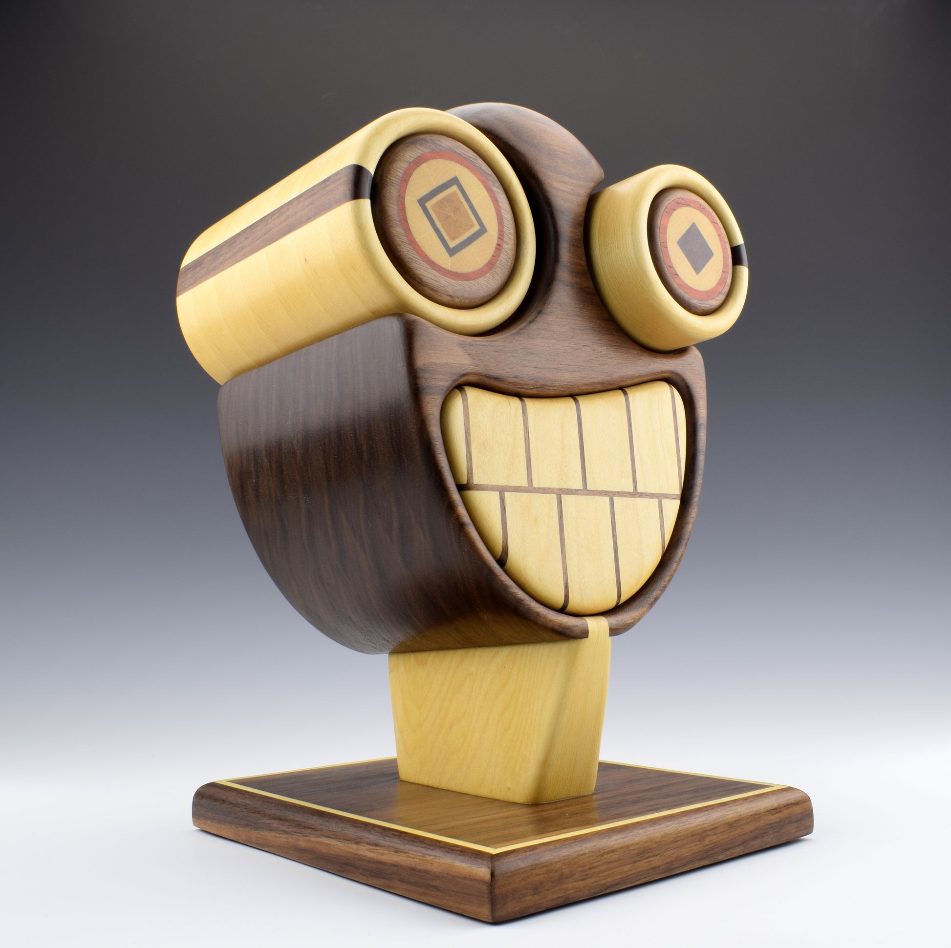 Bandsaw Box by Simon Roy made of walnut, maple, yellowheart, purpleheart and bloodwood. My most expressive design to say the least. Handcrafted in Canada.