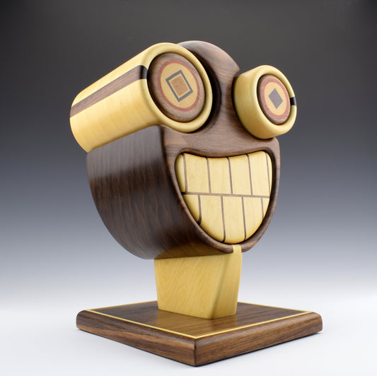 Bandsaw Box by Simon Roy made of walnut, maple, yellowheart, purpleheart and bloodwood. My most expressive design to say the least. Handcrafted in Canada.