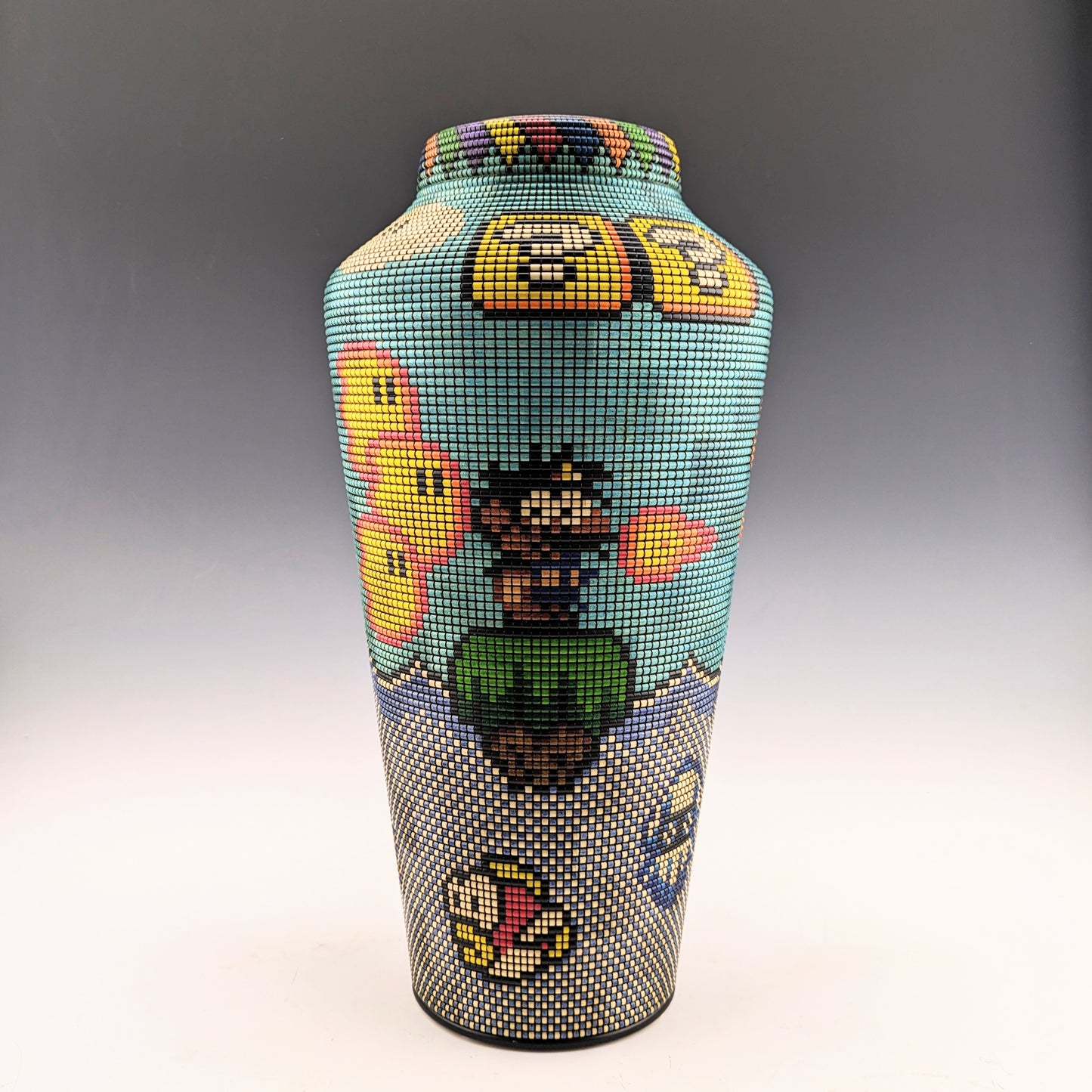 Pixelized Fan Art Vase by Simon Roy. Screw-on lid with hidden compartment. Segmented maple, textured and inked. 
Handcrafted in Canada by roysbox