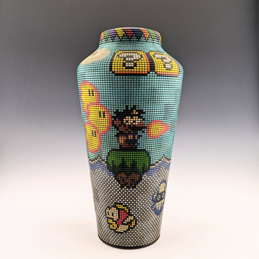 Pixelized Fan Art Vase by Simon Roy. Screw-on lid with hidden compartment. Segmented maple, textured and inked. 
Handcrafted in Canada by roysbox