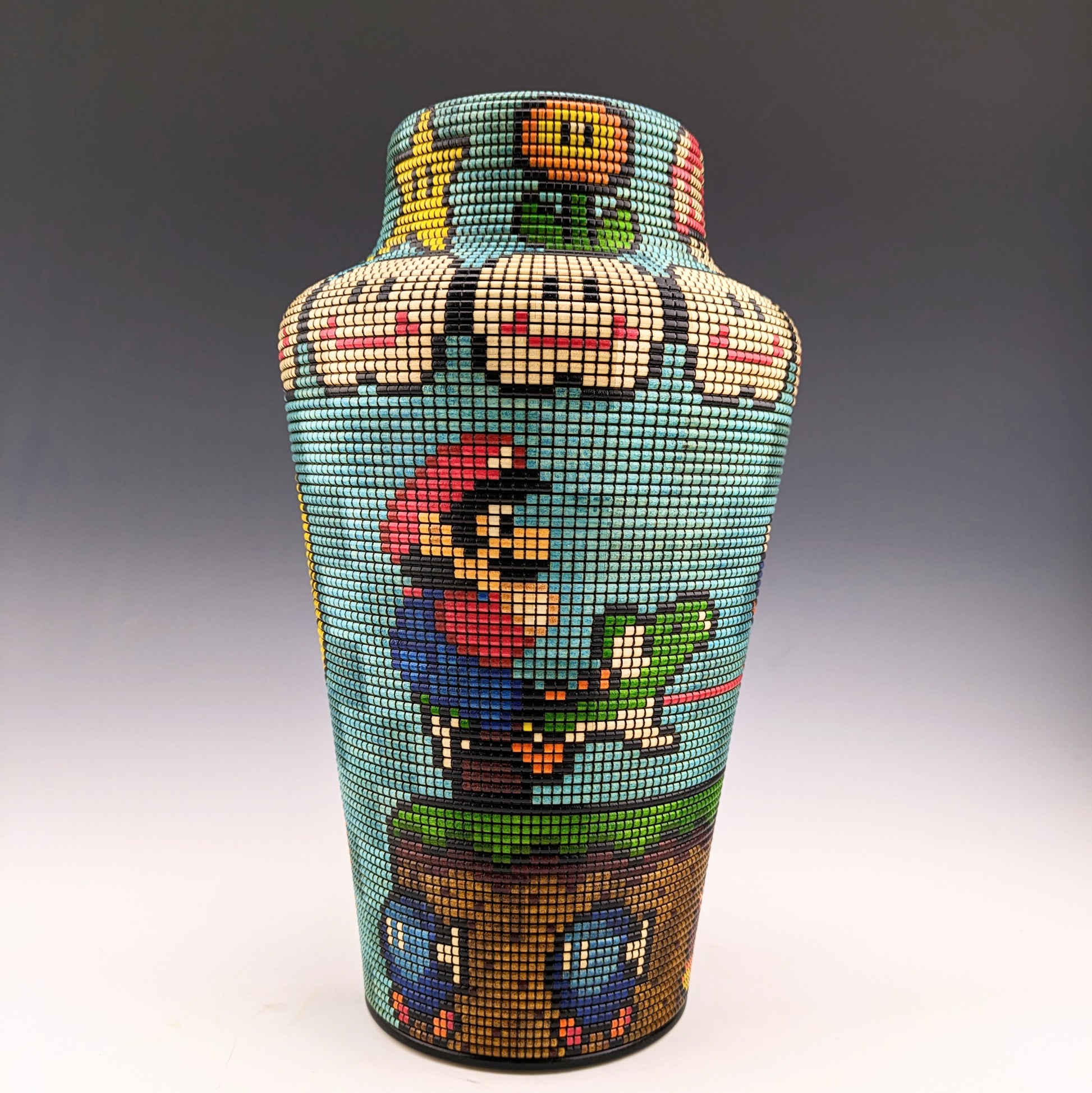 Pixelated Vase featuring Nintendo characters. Segmented maple, textured and inked one pixel at a time by a very patient Canadian craftsman. hidden compartment inside.