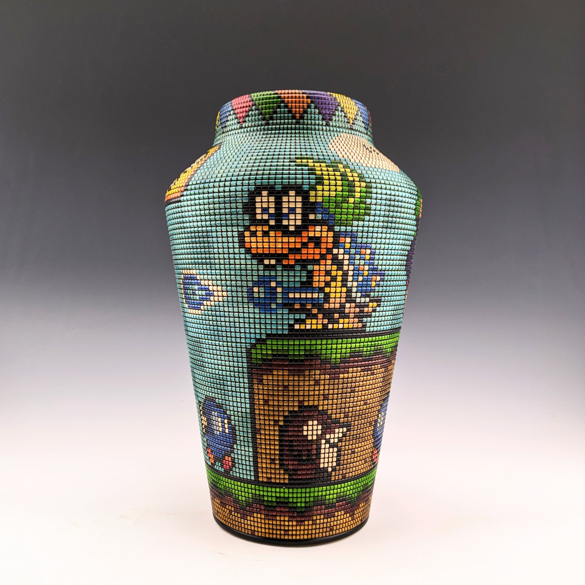 One-of-a-kind Pixel art vase by Simon Roy displaying Super Mario World characters in a carefully crafted freeze framed scene. Features a screw-on lid with a hidden compartment. Made in Canada. roysbox