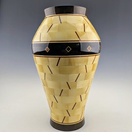 Segmented Vase with a hidden box made of maple, wenge and bloodwood. Designed and crafted in Canada by Simon Roy