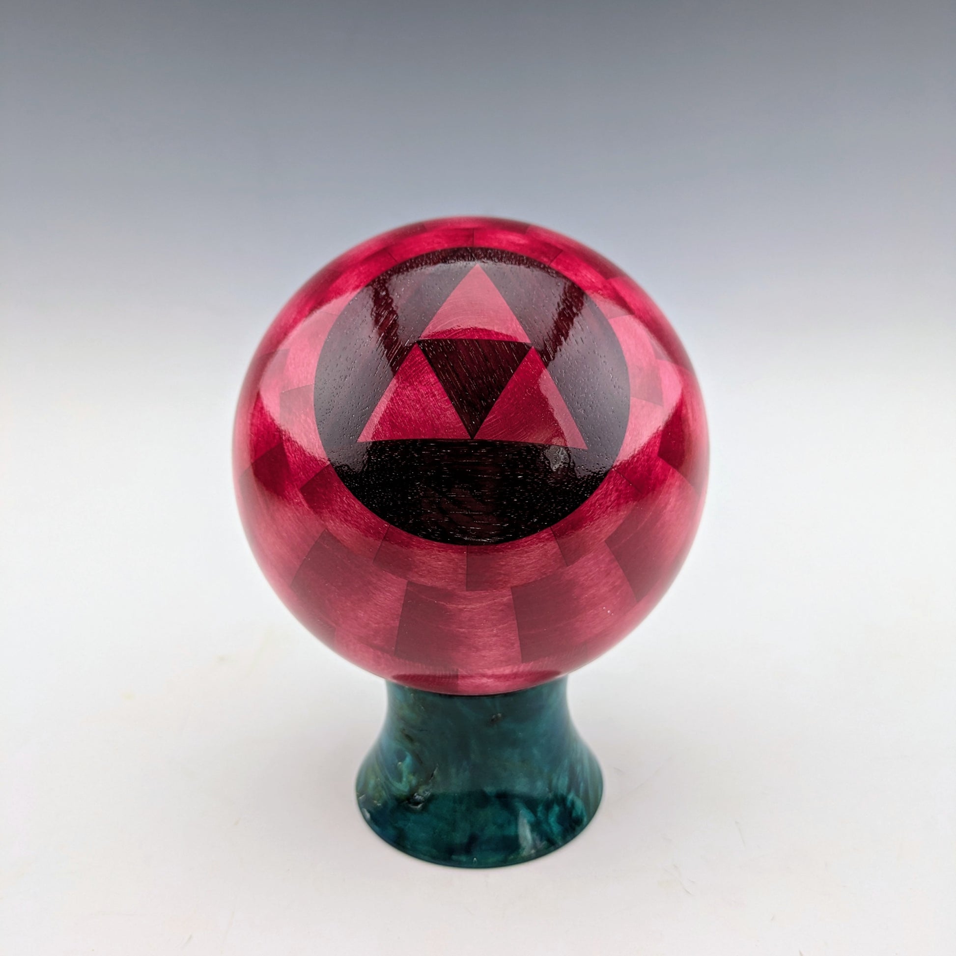 Red Ball Box on a blue burl stand. Made in Canada by roysbox with maple and walnut