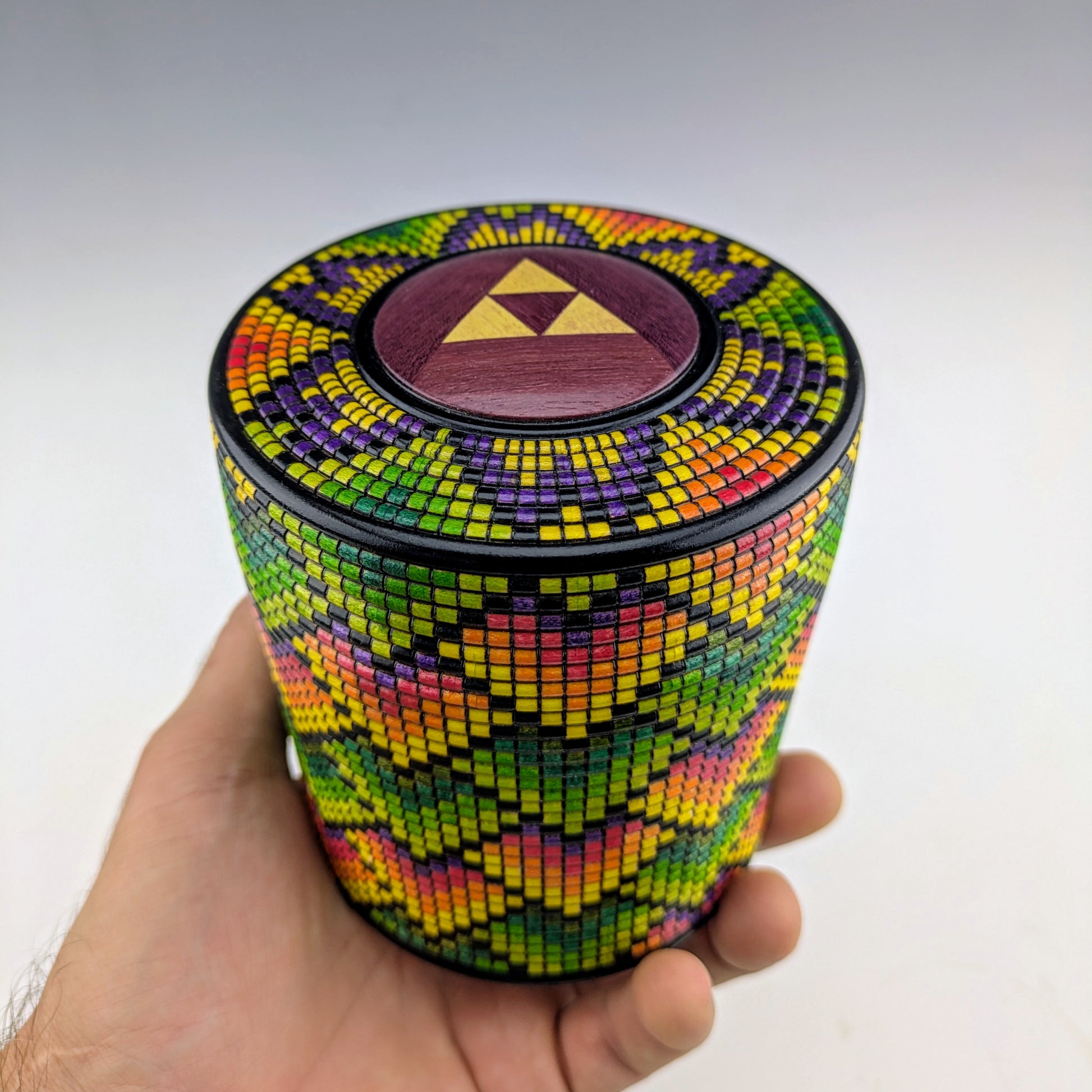 Basket Illusion box with a threaded lid inside the treaded lid. Handcrafted in Canada by roysbox with maple, purpleheart, yellowheart and india ink