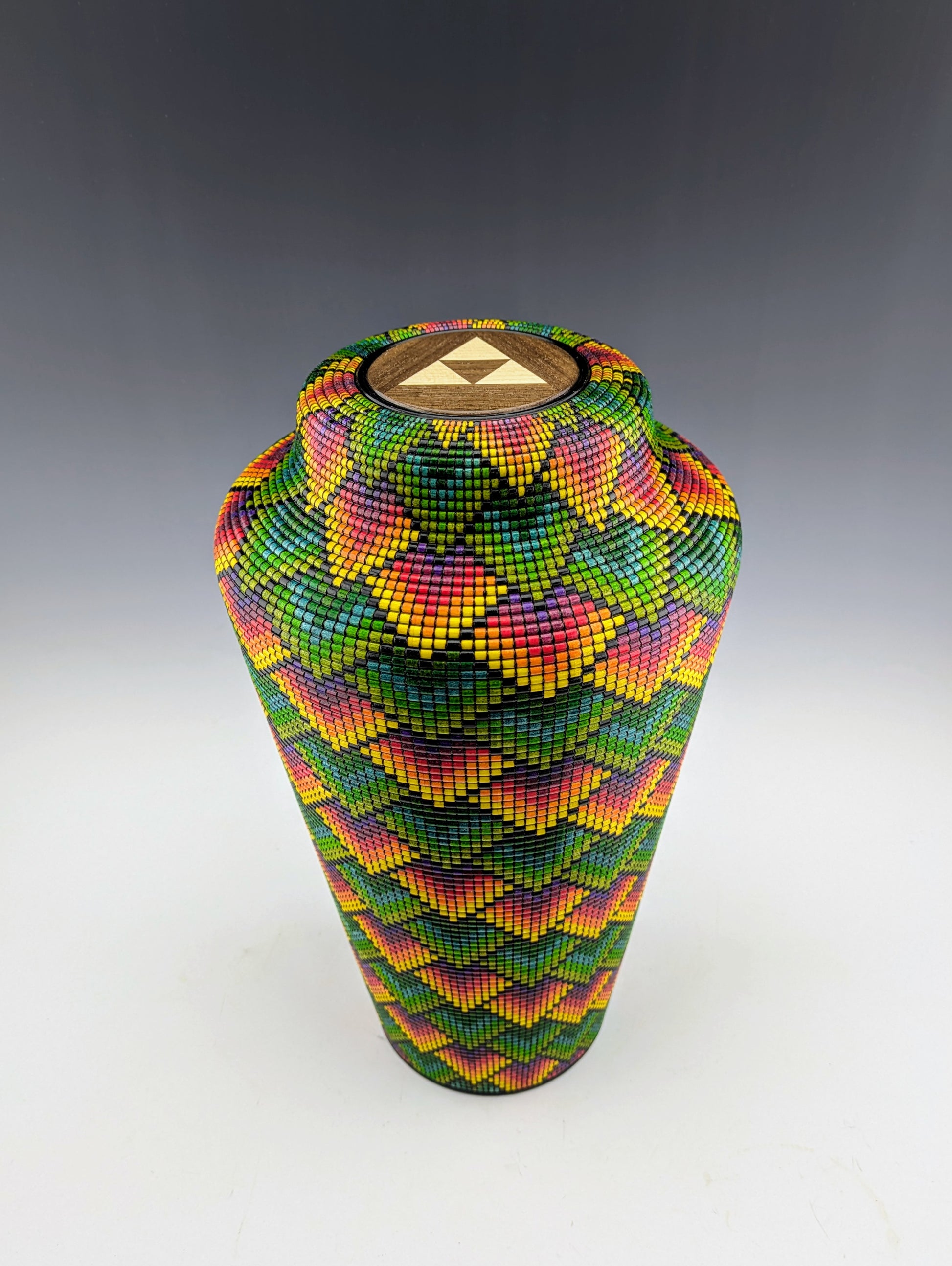 Pixel Art Vase by Simon Roy. Made of segmented maple, textured and inked. Features a hidden compartment inside the threaded lid. Handcrafted in Canada