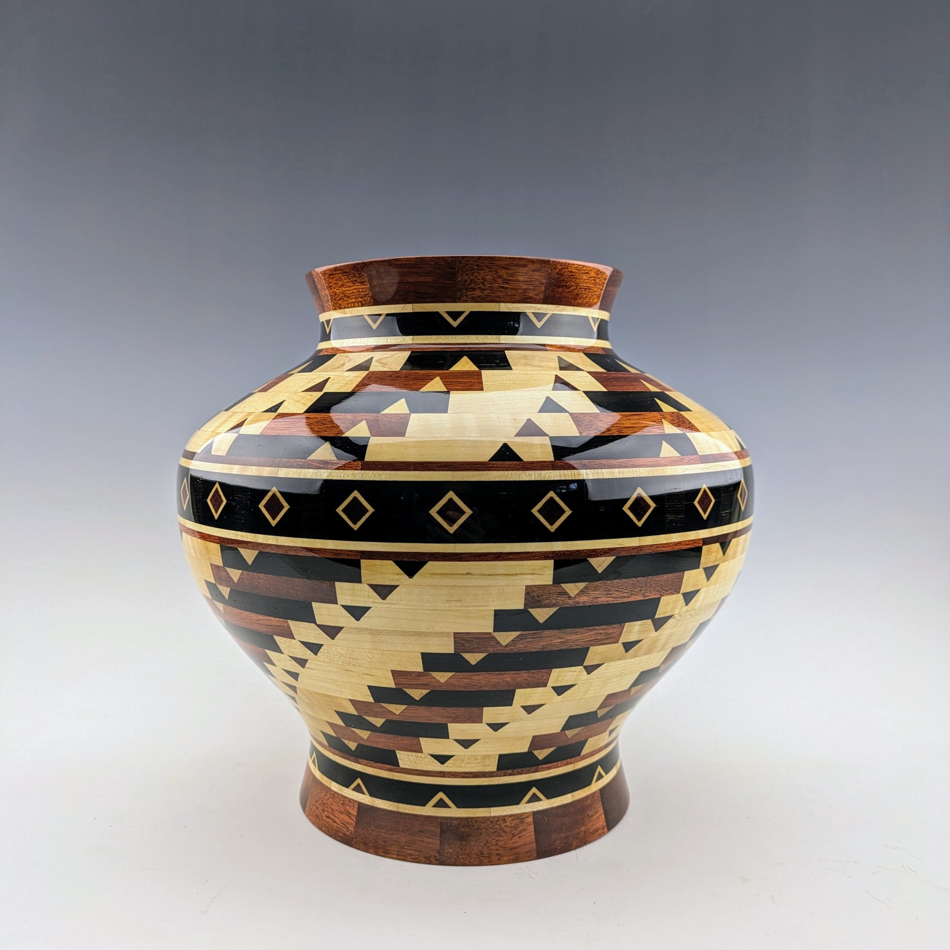 Segmented Vase made of maple, wenge and bloodwood. Handcrafted in Canada by roysbox