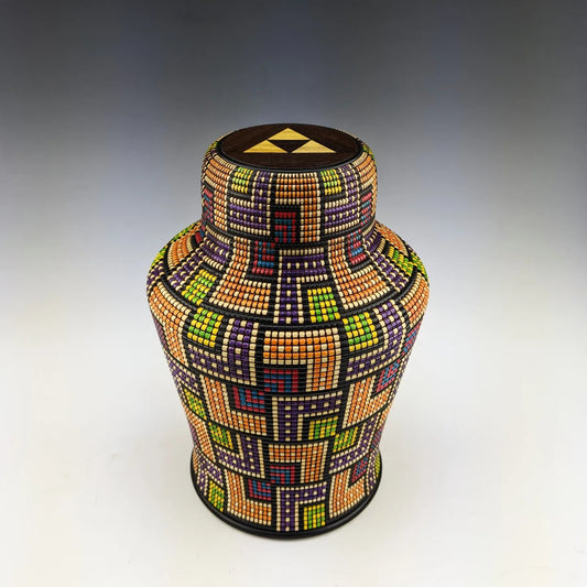 Pixel art vase by Simon Roy. Handmade in canada with maple, wenge, yellowheart and india ink.